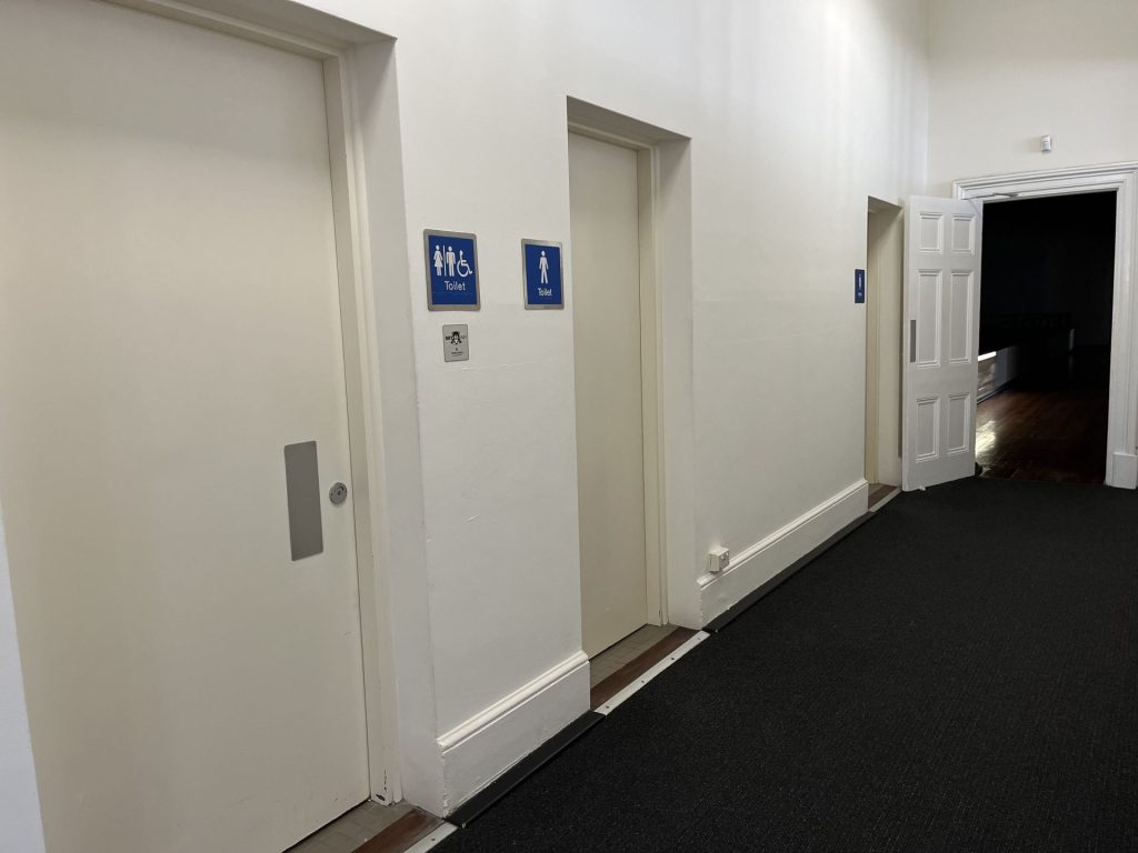 Doors to the different first floor toilets and baby change facilities